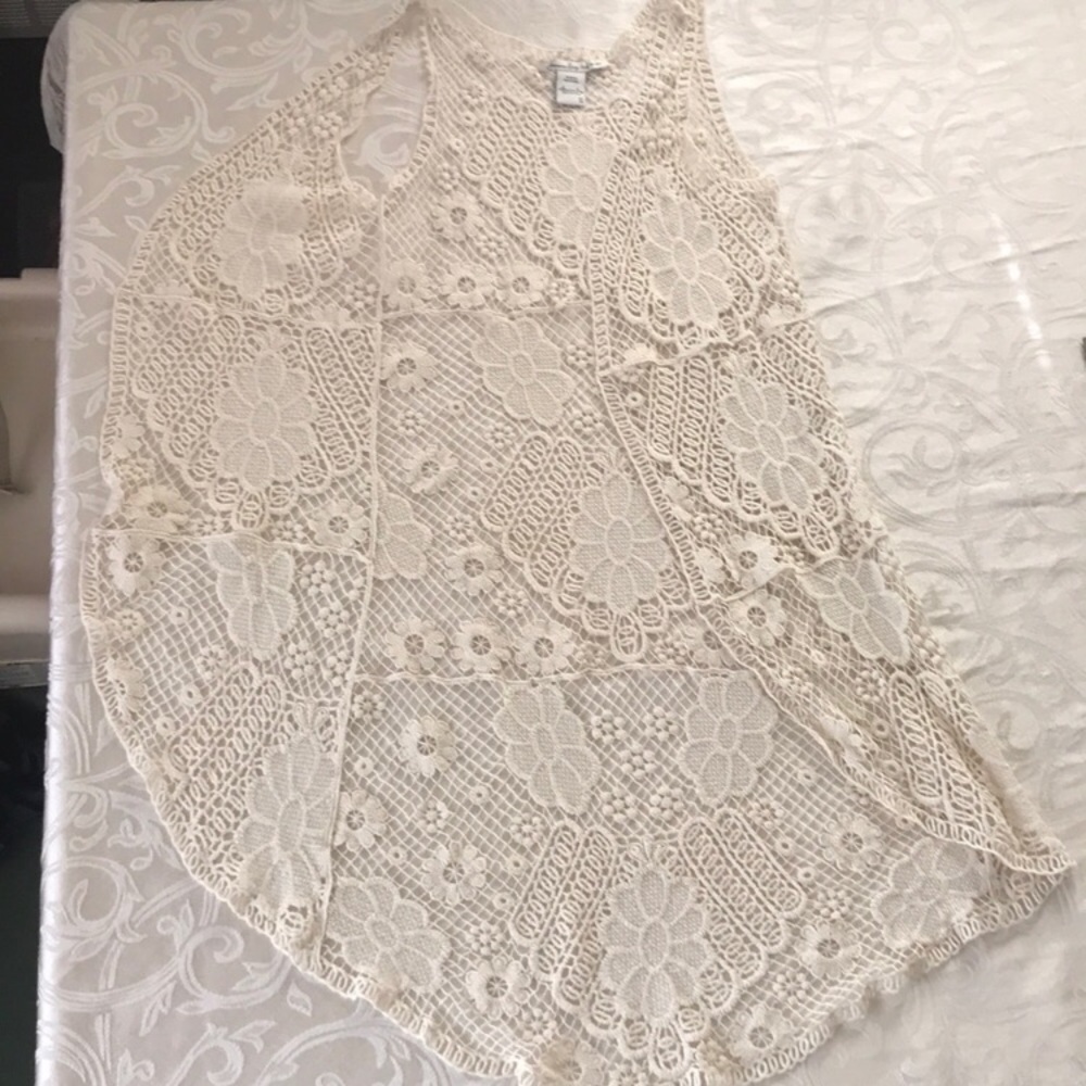 Cream sleeveless cardigan